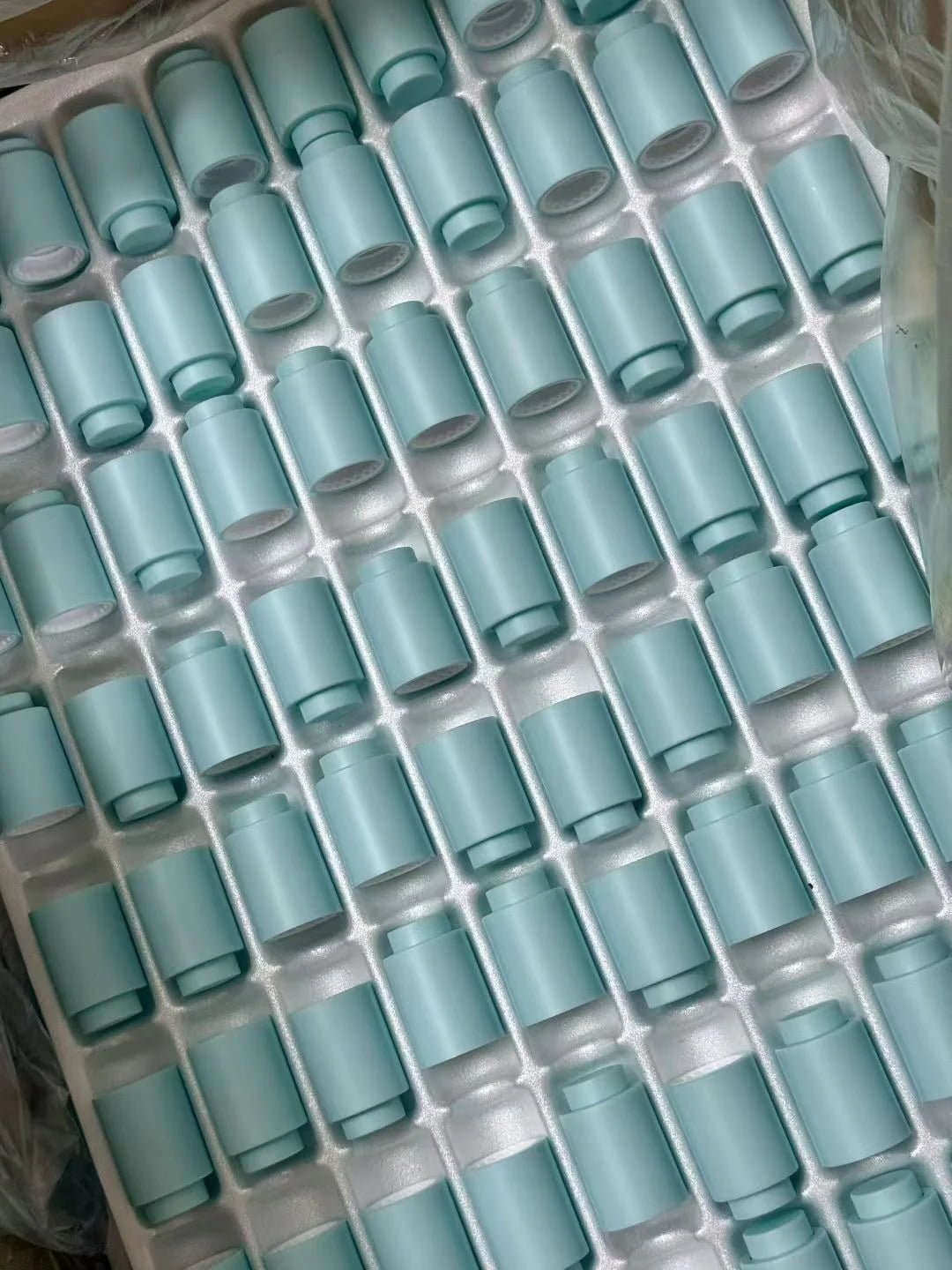 Matte black lacquer cap finish for luxury perfume bottle