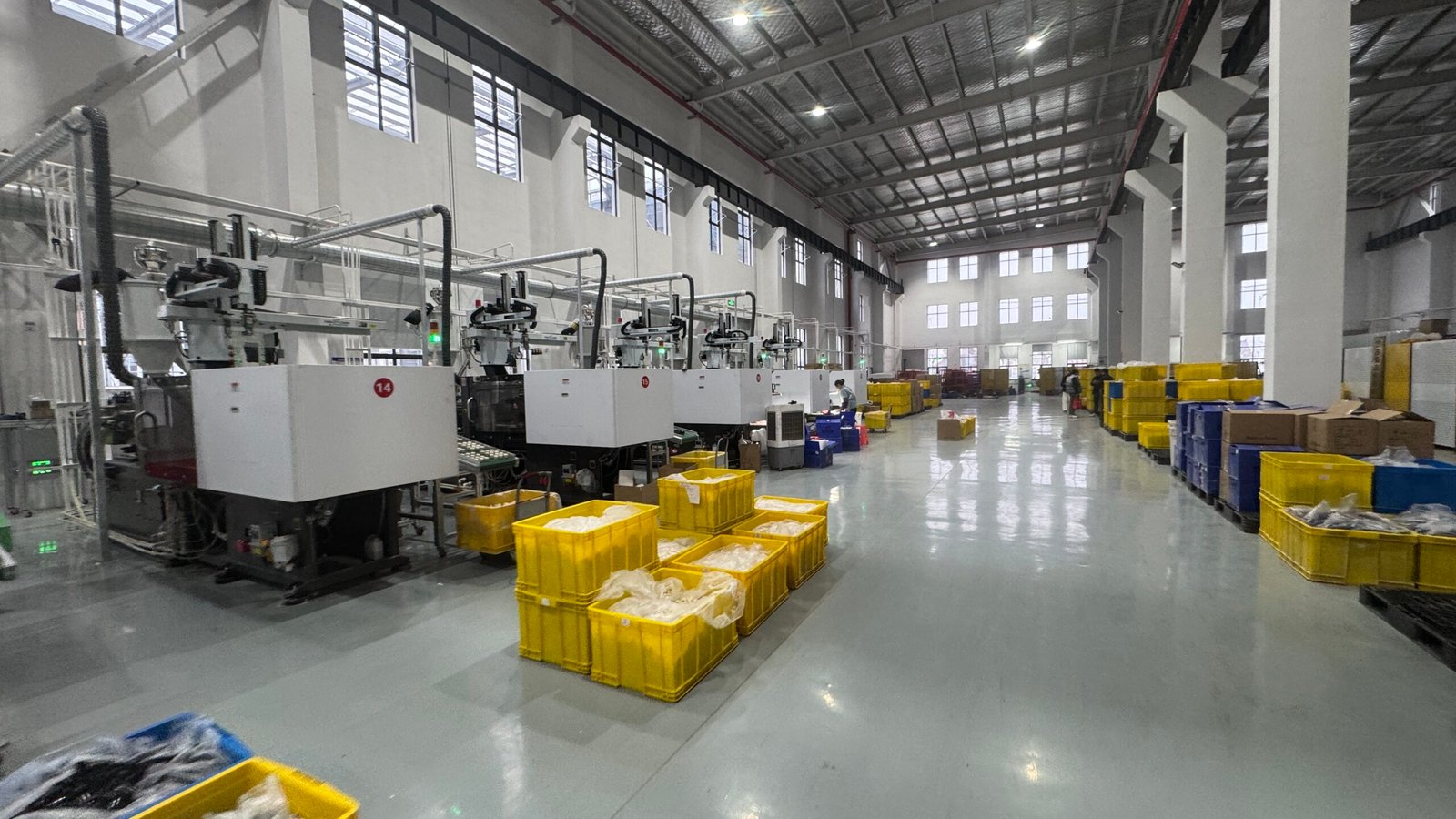 Luxury glass packaging accessory components arranged on dark surface