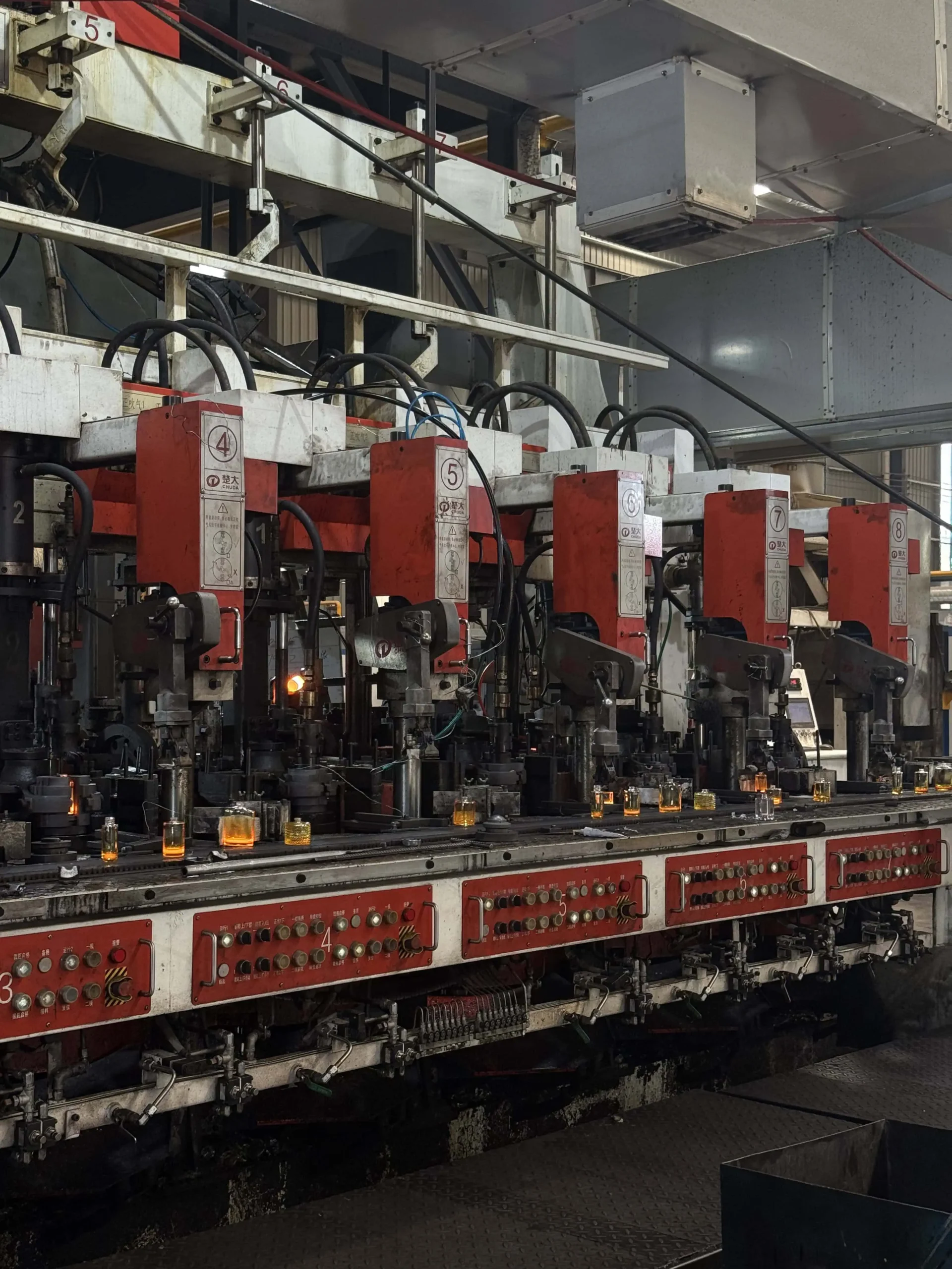 JTGlass manufacturing facility -- luxury glass perfume bottle production