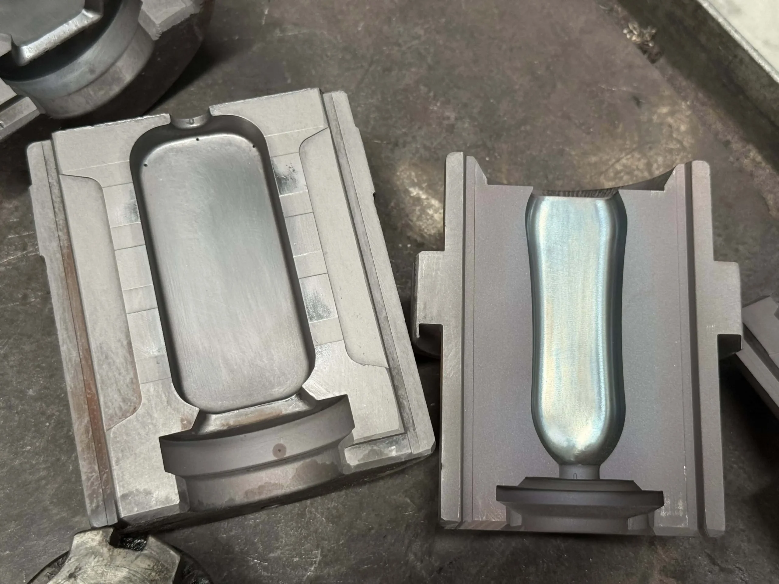 Finished cast iron mold halves ready for glass production