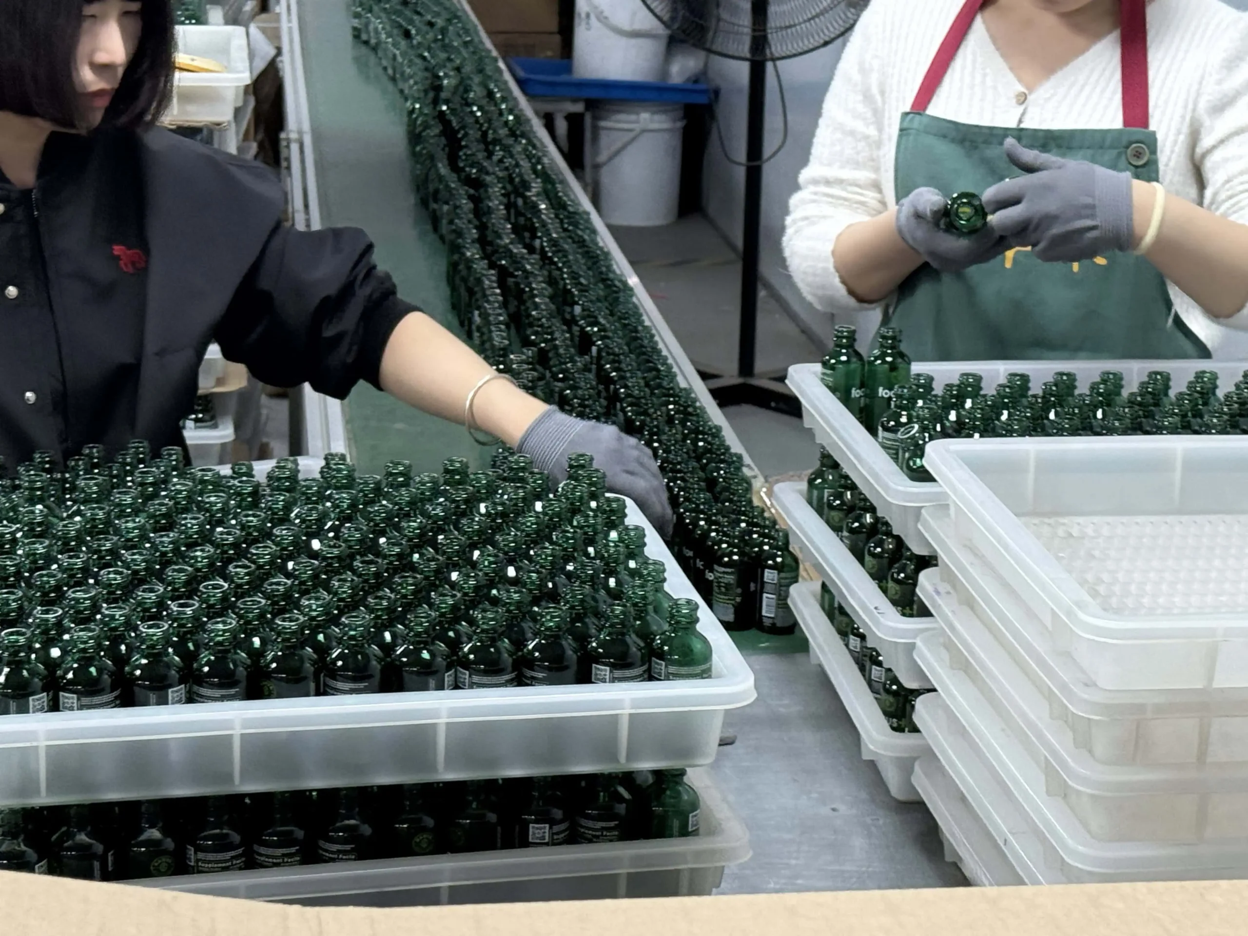 Quality control inspection area for luxury glass perfume bottles