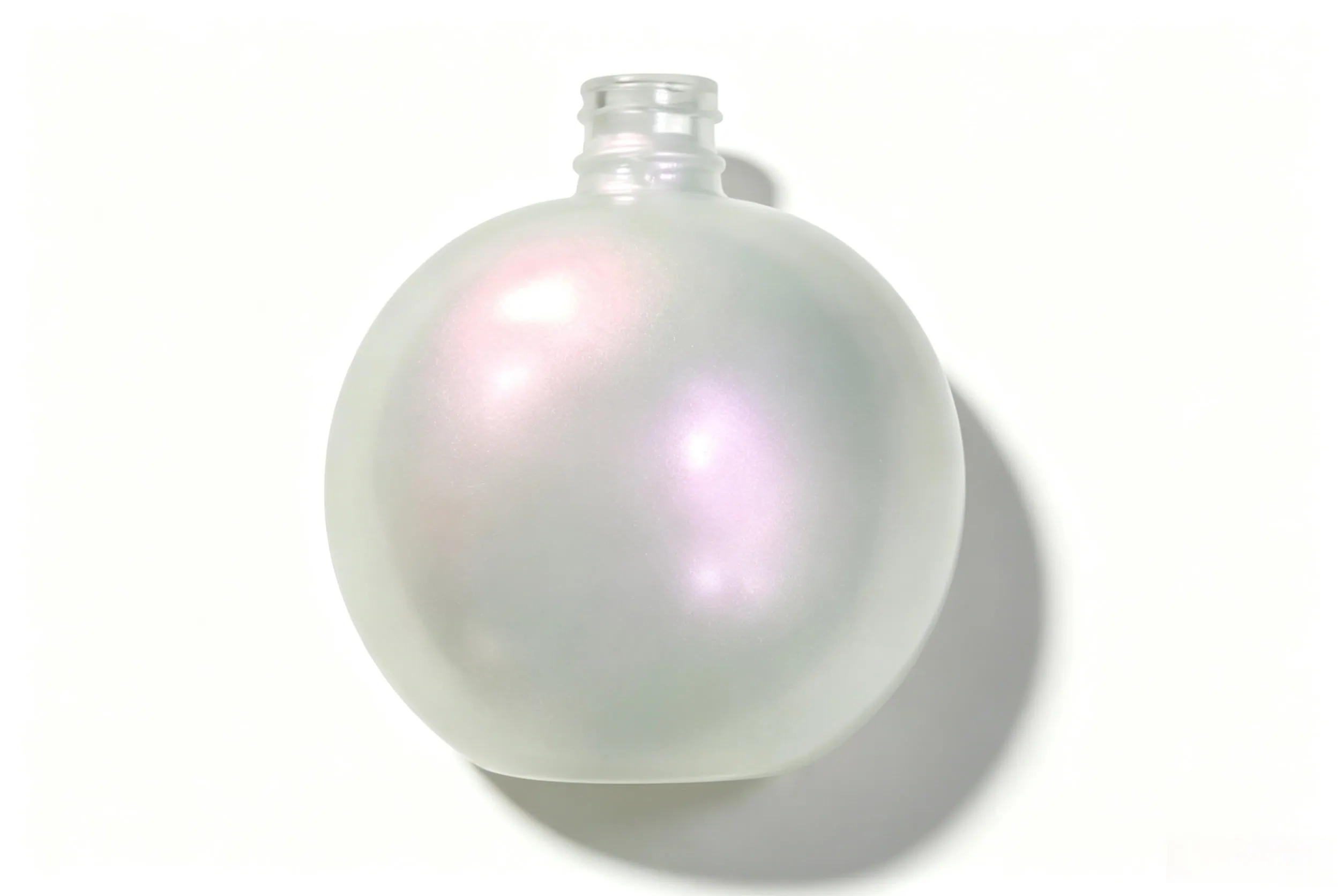 Pearl lustre finish on luxury glass bottle